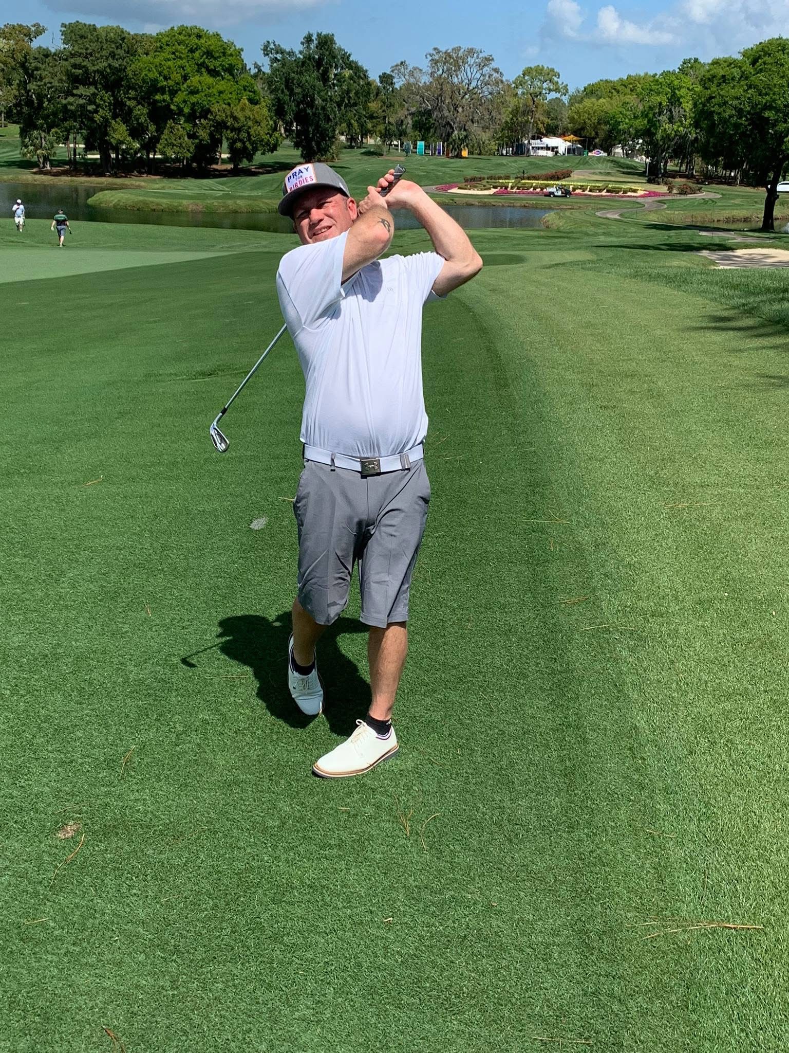 Bryan Conway following through on a tee shot